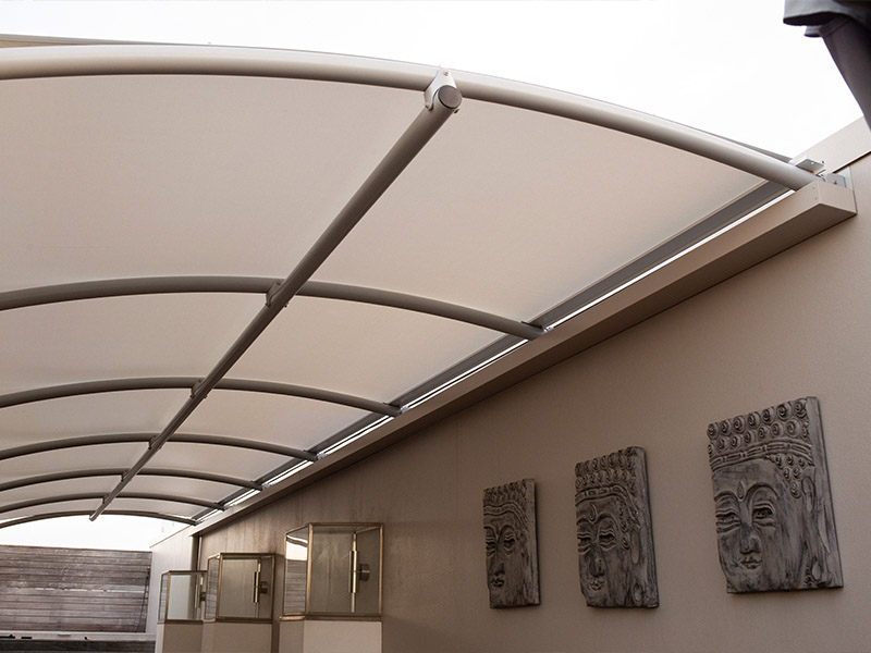 fixed shade sail roof withstands high winds and gives total rain and sun protection so create an outdoor living space