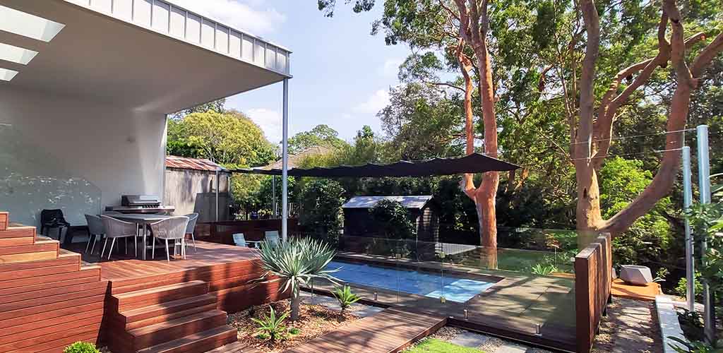 Retractable shaderunner Shade Sail over pool